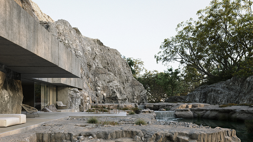 joão cepeda carves granite house into rugged cliffside in portugal