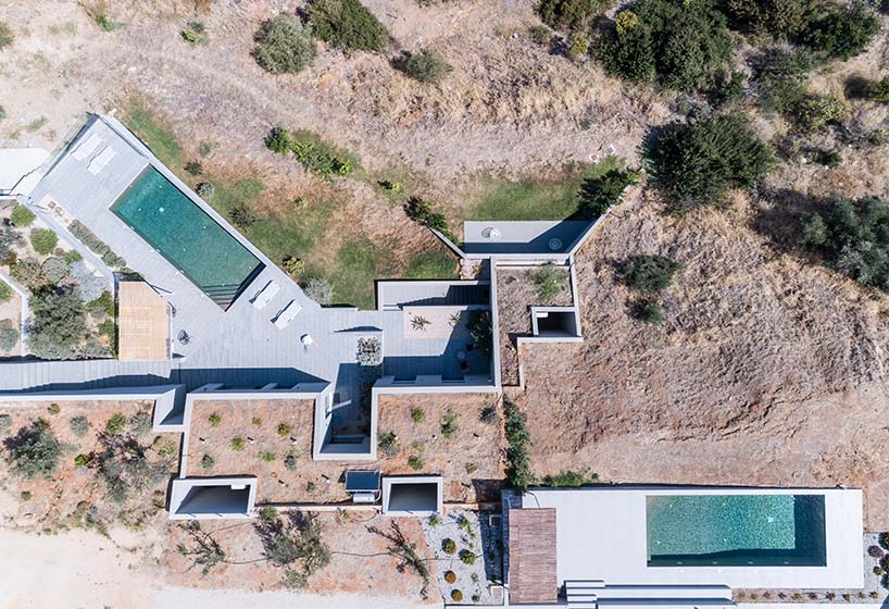 A2 architects nestles three houses into the greek coastline designboom