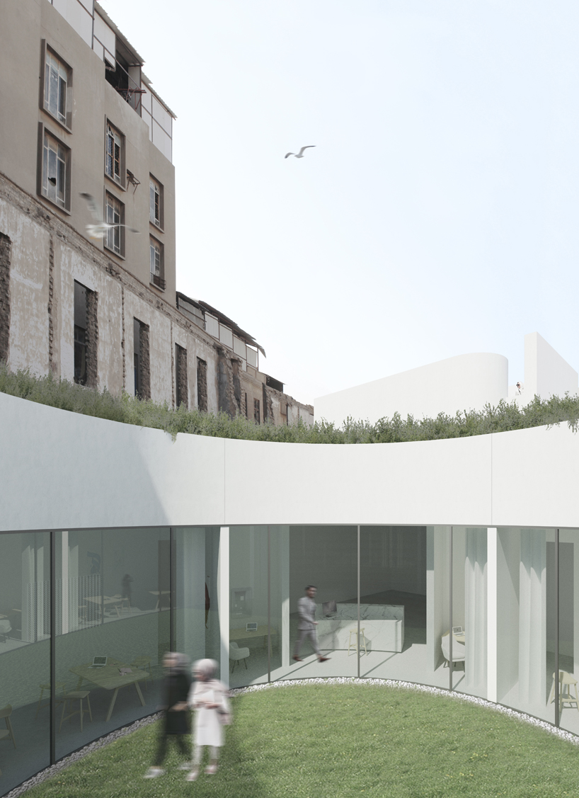 rzlbd retains historical façade to create new baghdad design centre