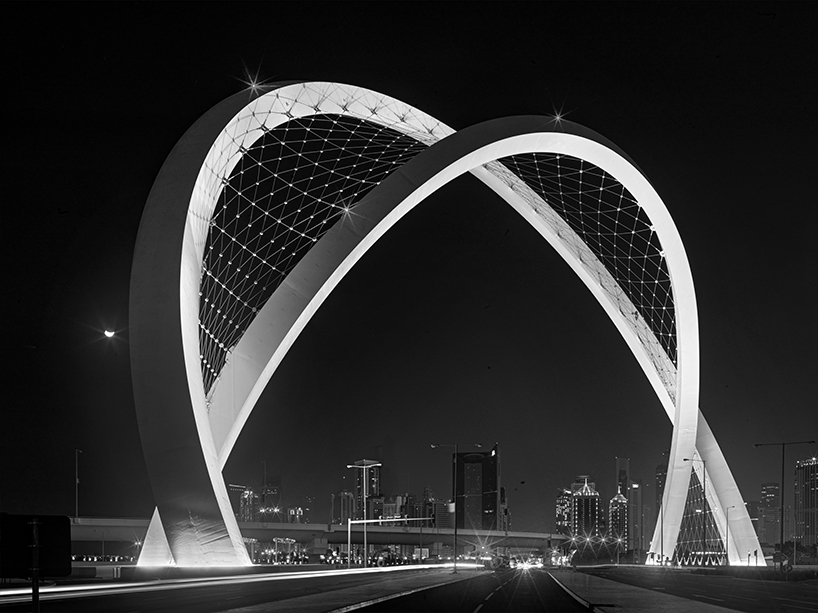 soaring al wahda arches by erik behrens intertwine to mark qatar's thriving future & pearl-diving heritage