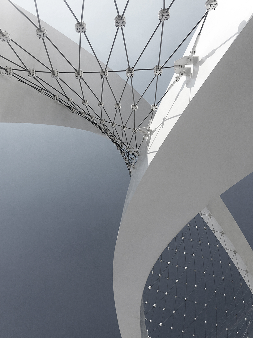 soaring al wahda arches by erik behrens intertwine to mark qatar's thriving future & pearl-diving heritage