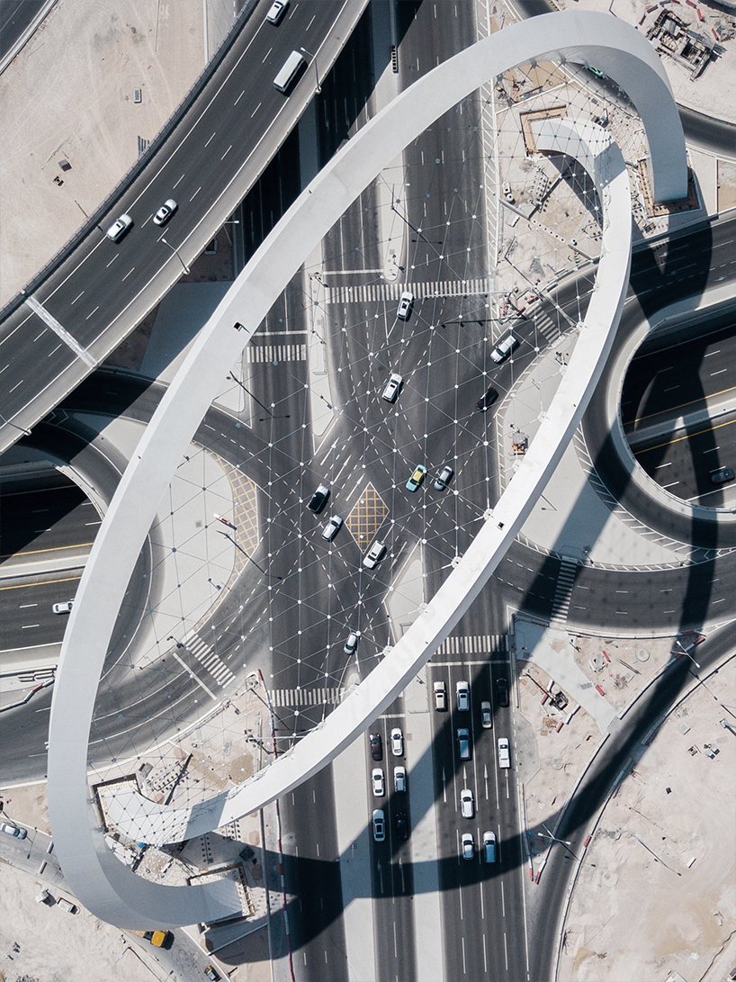 soaring al wahda arches by erik behrens intertwine to mark qatar's thriving future & pearl-diving heritage
