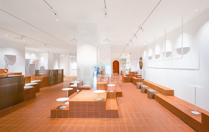 CLAP studio designs hong kong fashion cafe HER to be like landing on a 'new planet' designboom