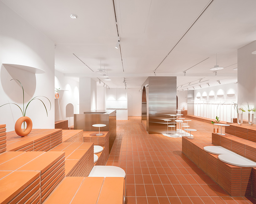 CLAP studio designs hong kong fashion cafe HER to be like landing on a 'new planet' designboom