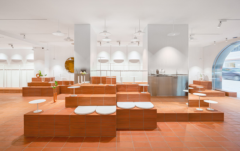 CLAP studio designs hong kong fashion cafe HER to be like landing on a 'new planet' designboom