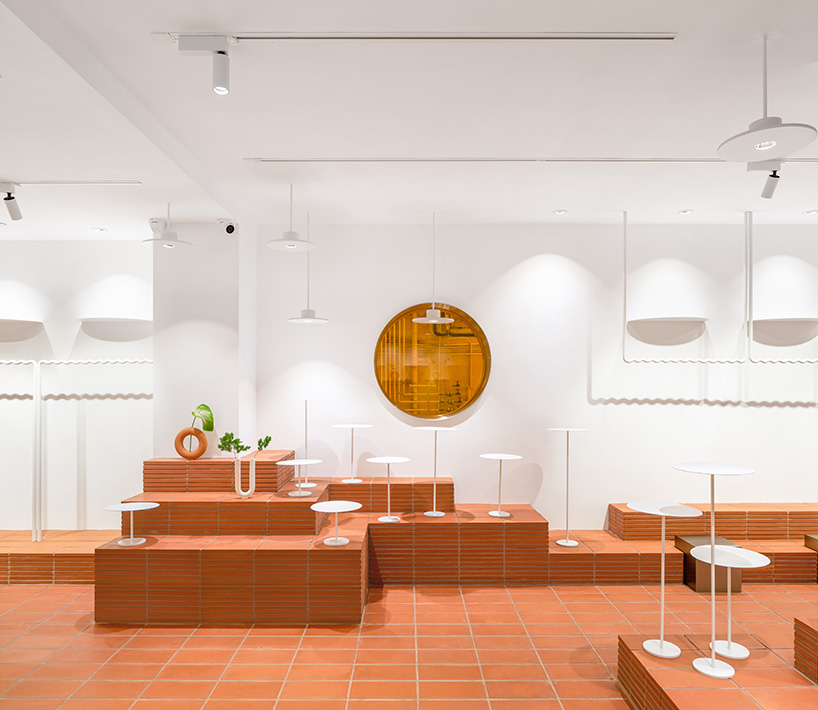 CLAP studio designs hong kong fashion cafe HER to be like landing on a 'new planet' designboom