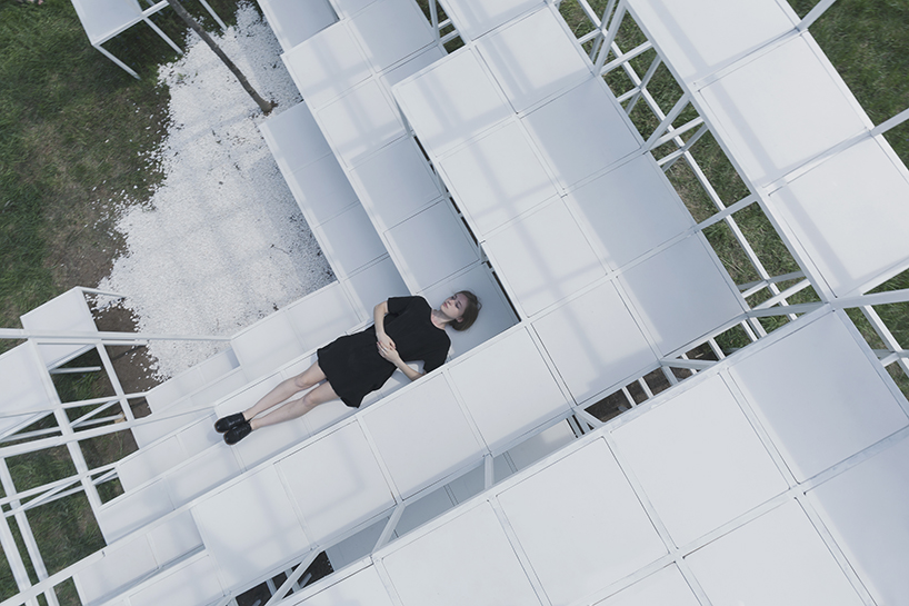 clap studio builds a geometric installation in memory of minsk's destroyed buildings designboom