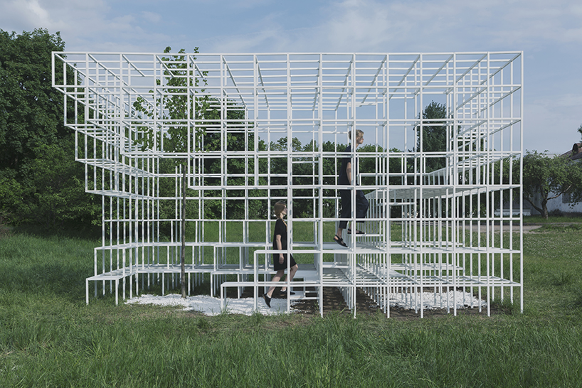 clap studio builds a geometric installation in memory of minsk's destroyed buildings designboom