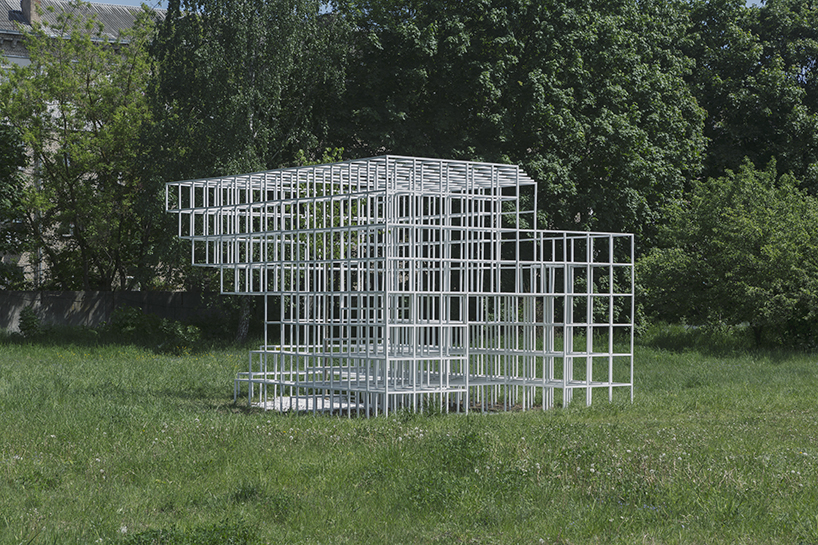 clap studio builds a geometric installation in memory of minsk's destroyed buildings designboom