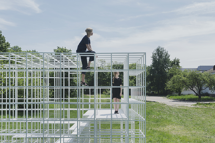 clap studio builds a geometric installation in memory of minsk's destroyed buildings designboom