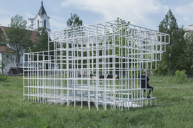 clap studio builds a geometric installation in memory of minsk's destroyed buildings designboom