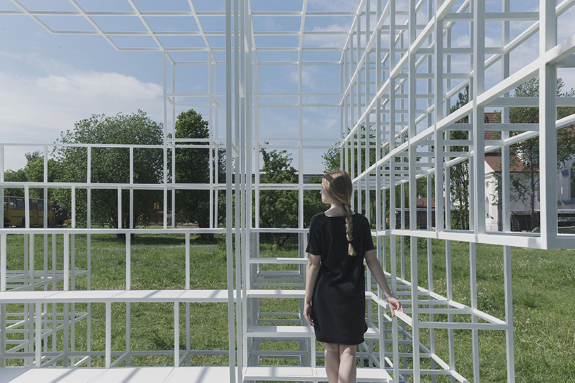 clap studio builds a geometric installation in memory of minsk's destroyed buildings designboom