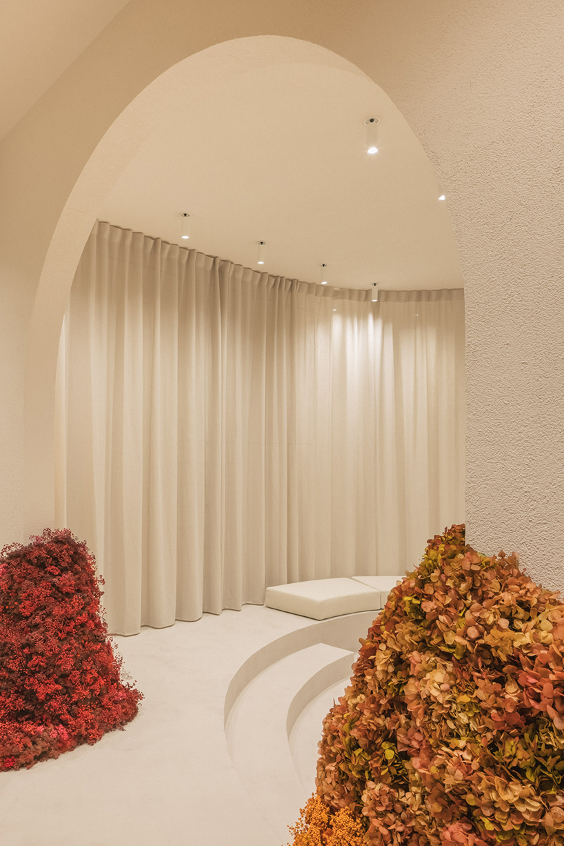 clap studio's floral installation at valencia showroom welcomes spring