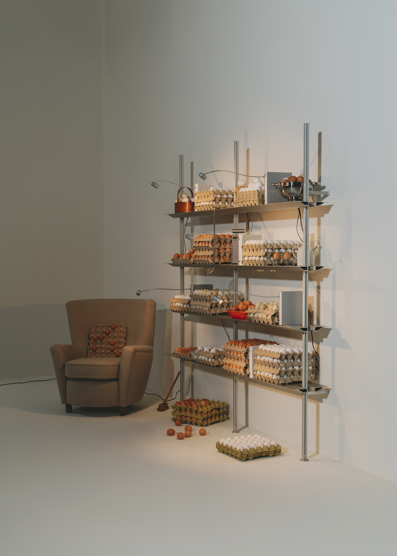 shaped like a book, oscar tusquets' bib luz lamp discreetly integrates into any shelf - 2