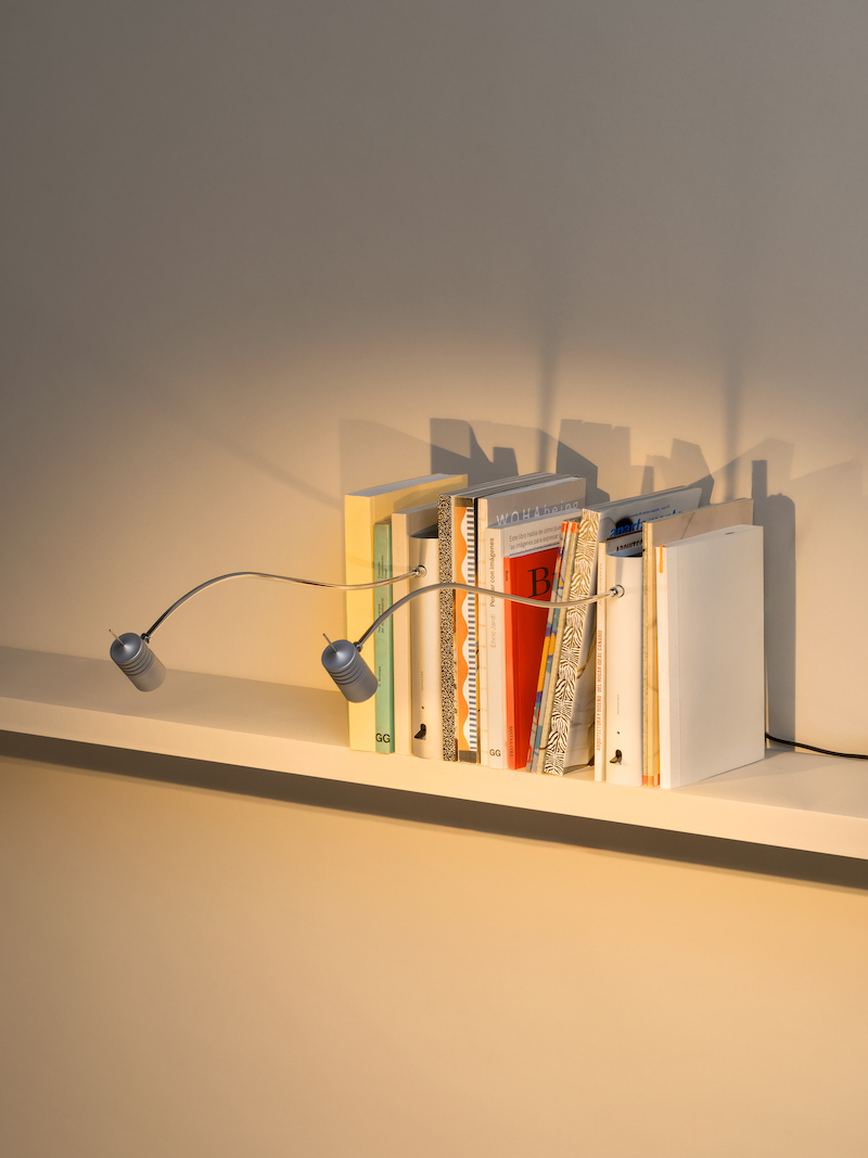 shaped like a book, oscar tusquets' bib luz lamp discreetly integrates into any shelf - 1