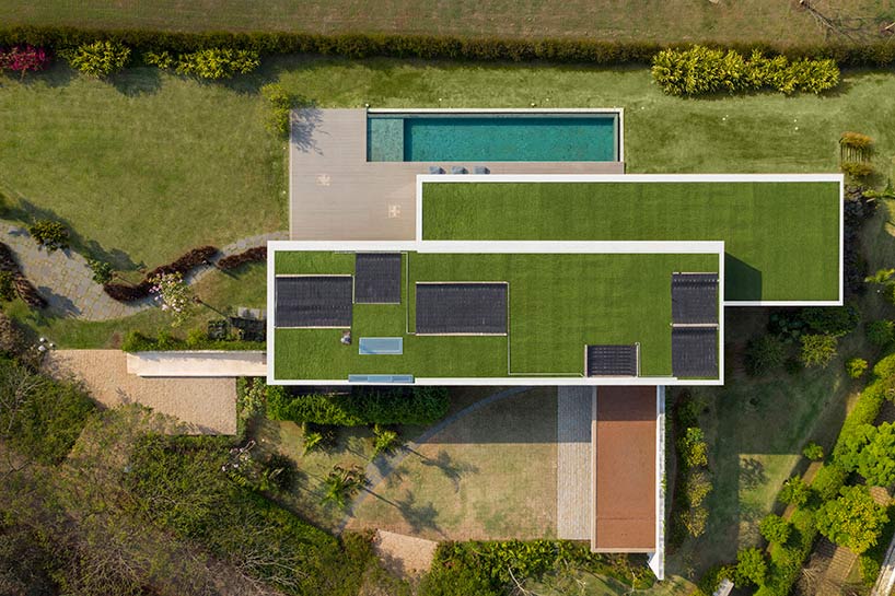 studio arthur casas composes JY house with two separate volumes in são paulo
