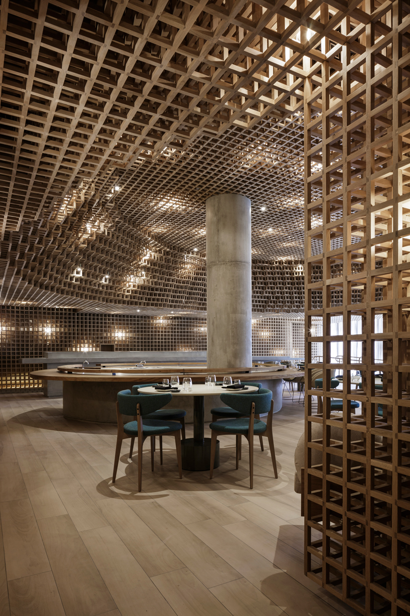 studio arthur casas installs detailed woodwork piece within kosushi restaurant in miami