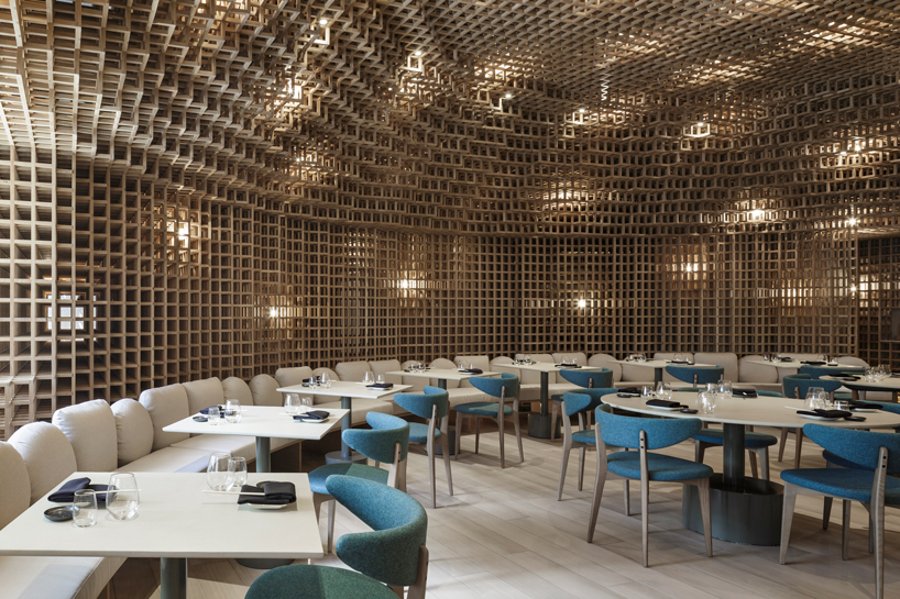 studio arthur casas installs detailed woodwork piece within kosushi restaurant in miami