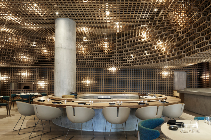 studio arthur casas installs detailed woodwork piece within kosushi restaurant in miami