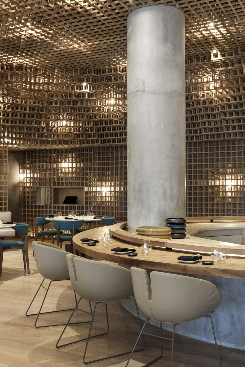 studio arthur casas installs detailed woodwork piece within kosushi restaurant in miami