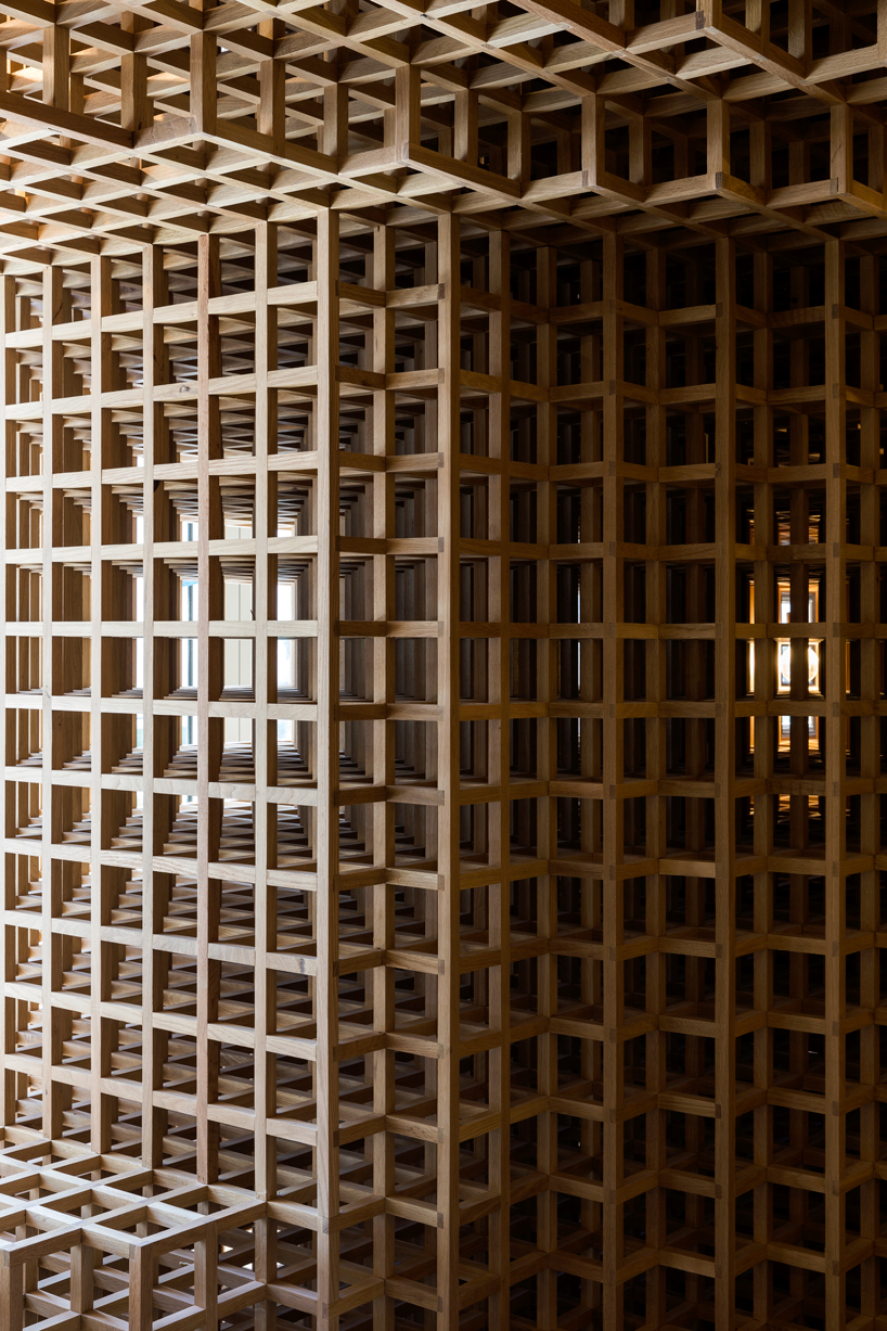 studio arthur casas installs detailed woodwork piece within kosushi restaurant in miami