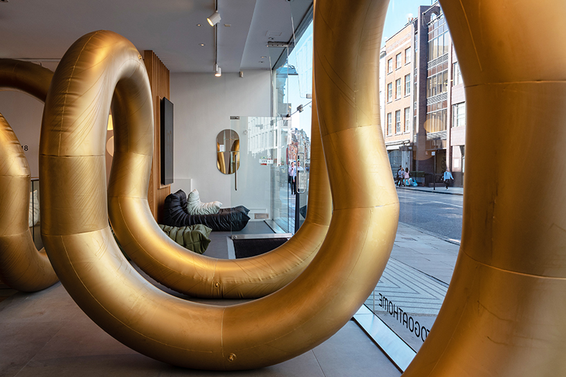 cyril lancelin fills ligne roset store with an inflatable maze of golden arches for LDF 2018