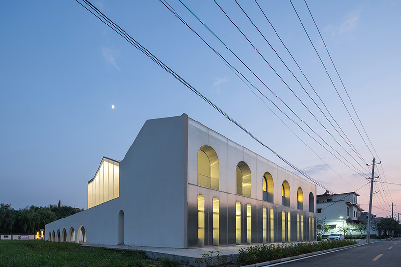 ideology humanity and nature intertwined renovation of the qinchang village cpc branch office community center an open cloister style community center 10