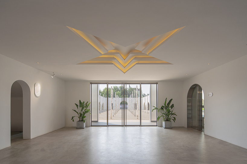 ideology humanity and nature intertwined renovation of the qinchang village cpc branch office community center an open cloister style community center 11