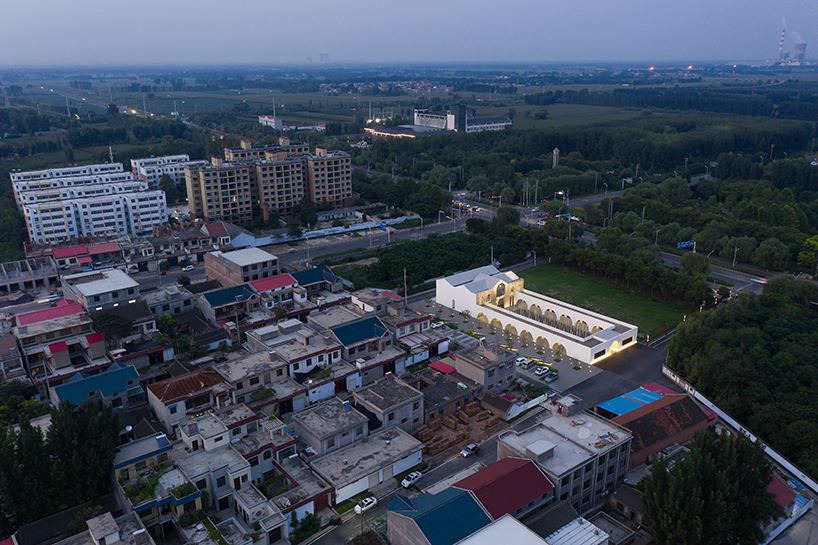 ideology humanity and nature intertwined renovation of the qinchang village cpc branch office community center an open cloister style community center 2
