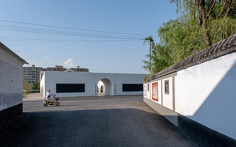 ideology humanity and nature intertwined renovation of the qinchang village cpc branch office community center an open cloister style community center 4