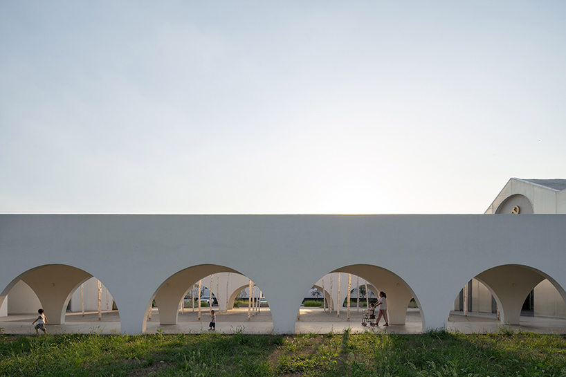 ideology humanity and nature intertwined renovation of the qinchang village cpc branch office community center an open cloister style community center 6