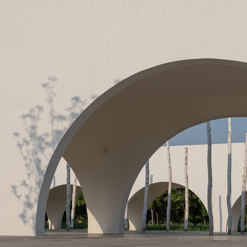 ideology humanity and nature intertwined renovation of the qinchang village cpc branch office community center an open cloister style community center 7