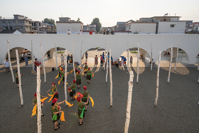 ideology humanity and nature intertwined renovation of the qinchang village cpc branch office community center an open cloister style community center 9