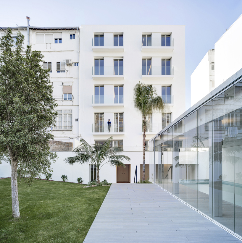 residential complex by ERRE arquitectura emerges as an urban oasis in the heart of valencia, spain