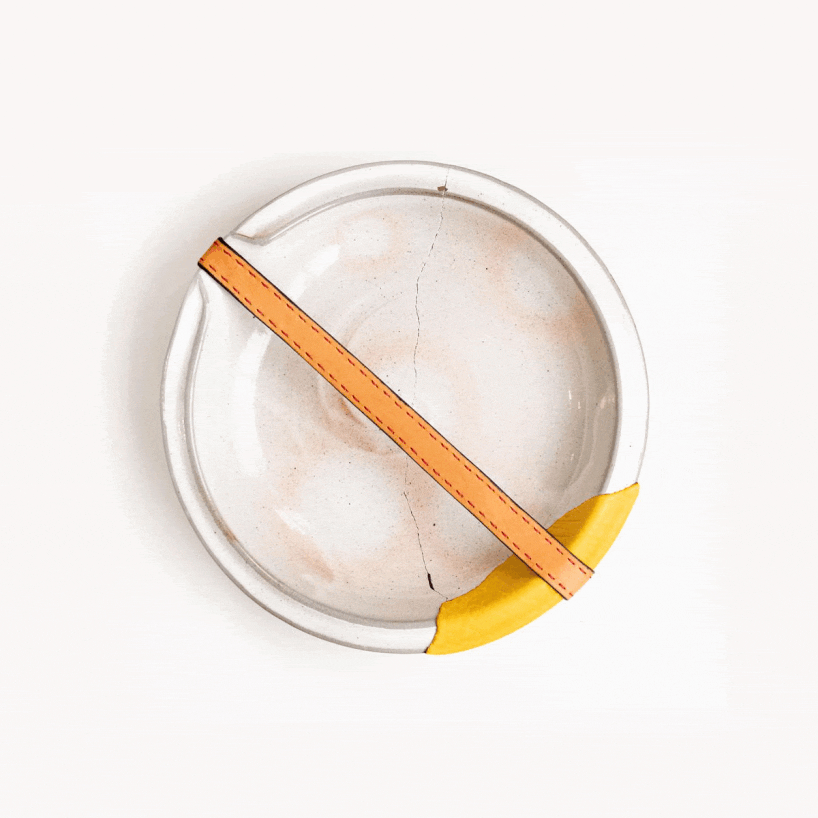 roee ben yehuda's kawatsugi salvages fragmented ceramics with leather interventions