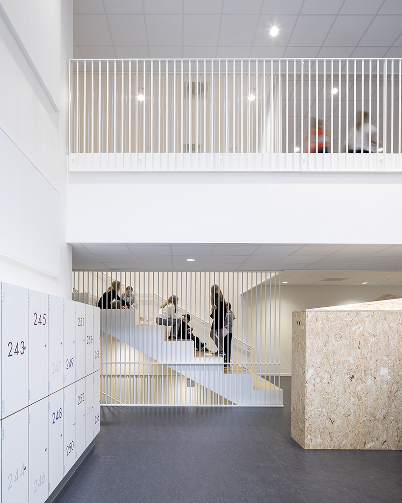 european school copenhagen clad with red bricks reflects its historical context - 12