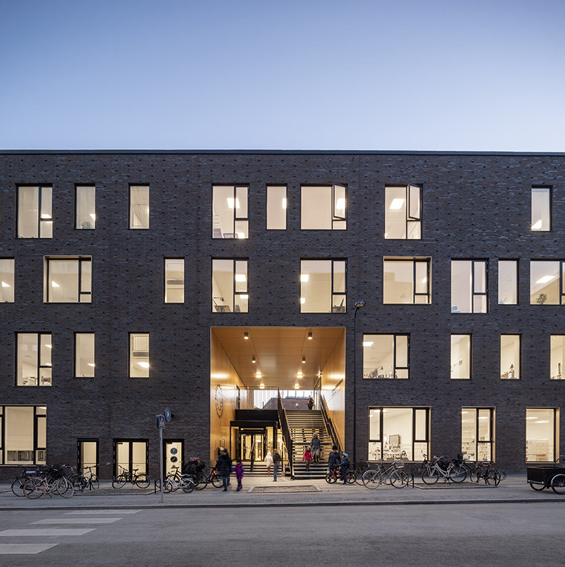 european school copenhagen clad with red bricks reflects its historical context - 1