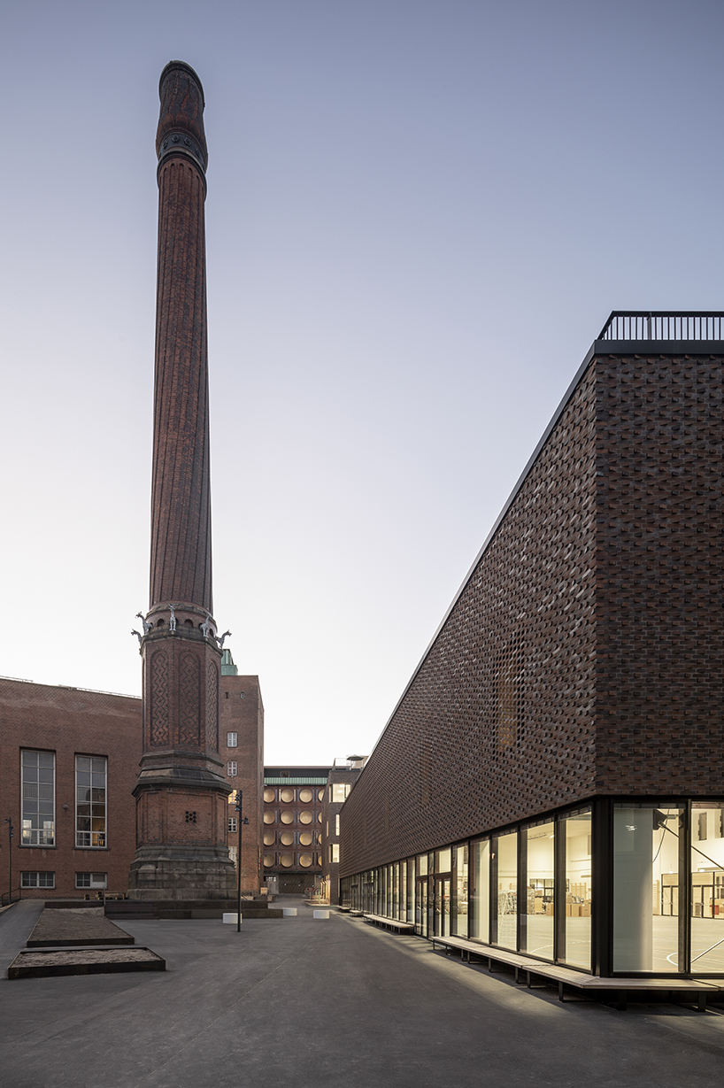 european school copenhagen clad with red bricks reflects its historical context - 6