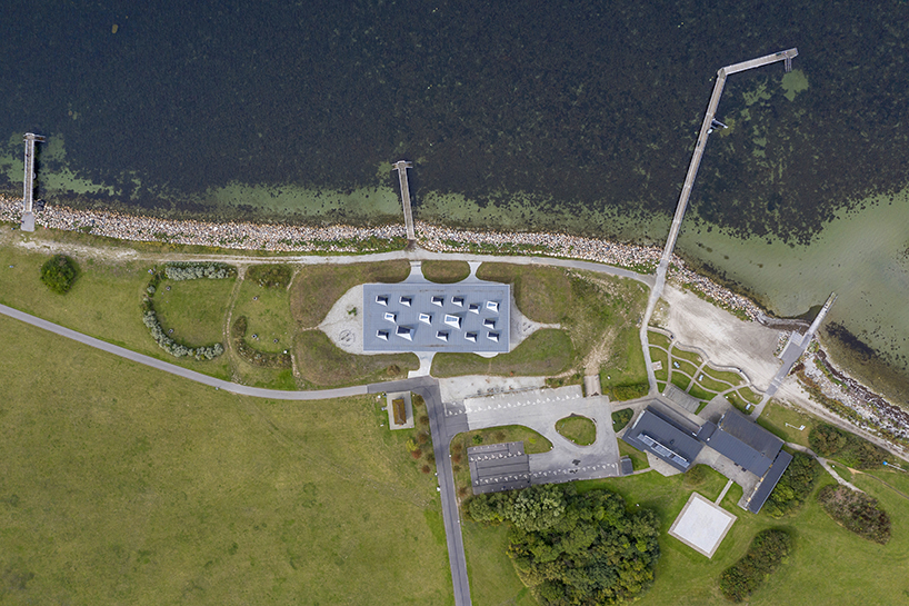 nord architects embeds a sustainable marine education center on the swedish coastline designboom