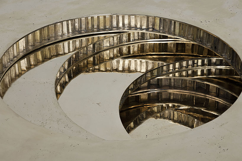 héctor esrawe renders aleatory textures of cardboard as polished bronze coffee tables