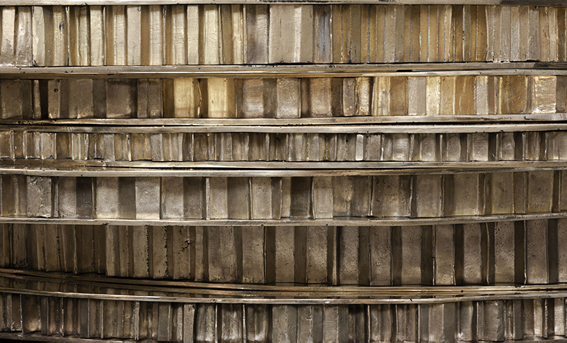 héctor esrawe renders aleatory textures of cardboard as polished bronze coffee tables