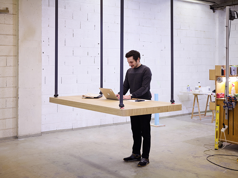 JCPCDR's 'flying table' uses detachable seat belts to suspend from the ceiling designboom