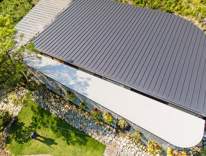 1-1 architects designs a family home for a tropical plant farmer in japan designboom