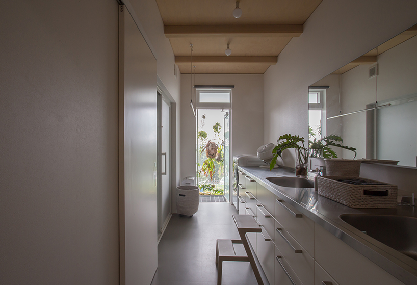 1-1 architects designs a family home for a tropical plant farmer in japan designboom