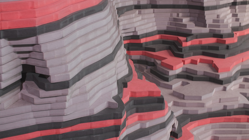 ENORME studio layers colored wood to represent 'astral bodies' that have landed on earth designboom