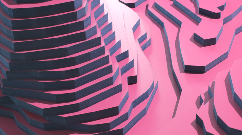 ENORME studio layers colored wood to represent 'astral bodies' that have landed on earth designboom