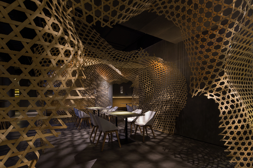 restaurant in china by infinity nide features traditional handmade bamboo weaving