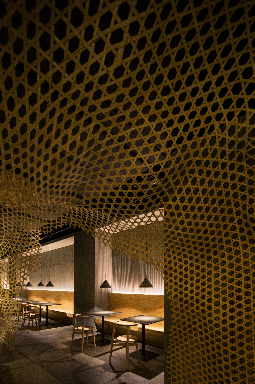 restaurant in china by infinity nide features traditional handmade bamboo weaving