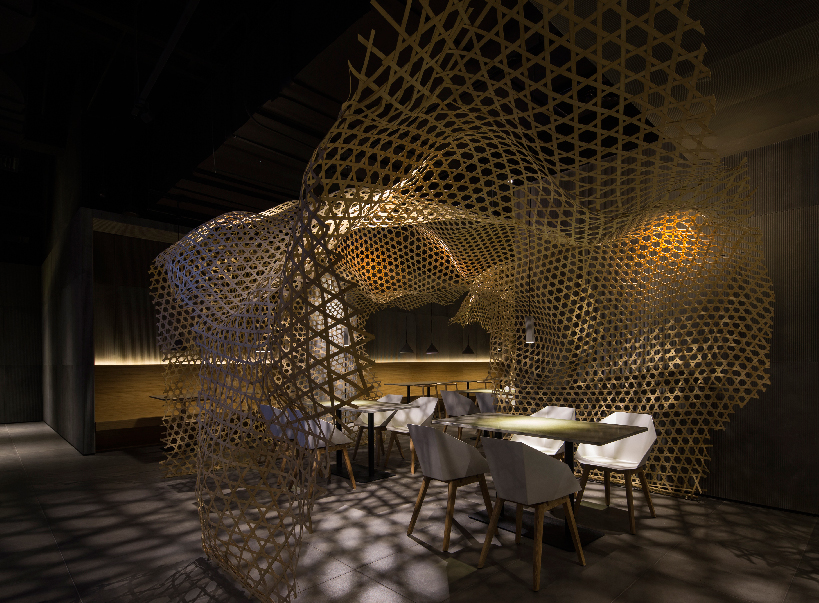 restaurant in china by infinity nide features traditional handmade bamboo weaving