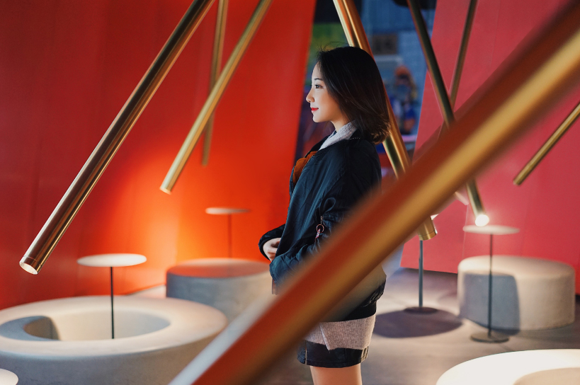 infinity nide's mole chha is a dome teahouse with red gradient walls and brass lighting tubes - 3